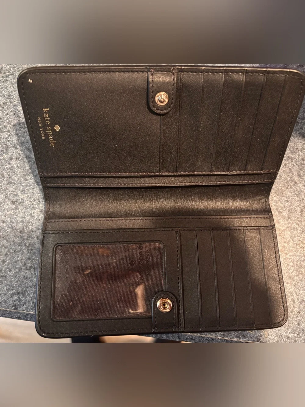 kate spade black pebbled leather clutch wallet with gold logo